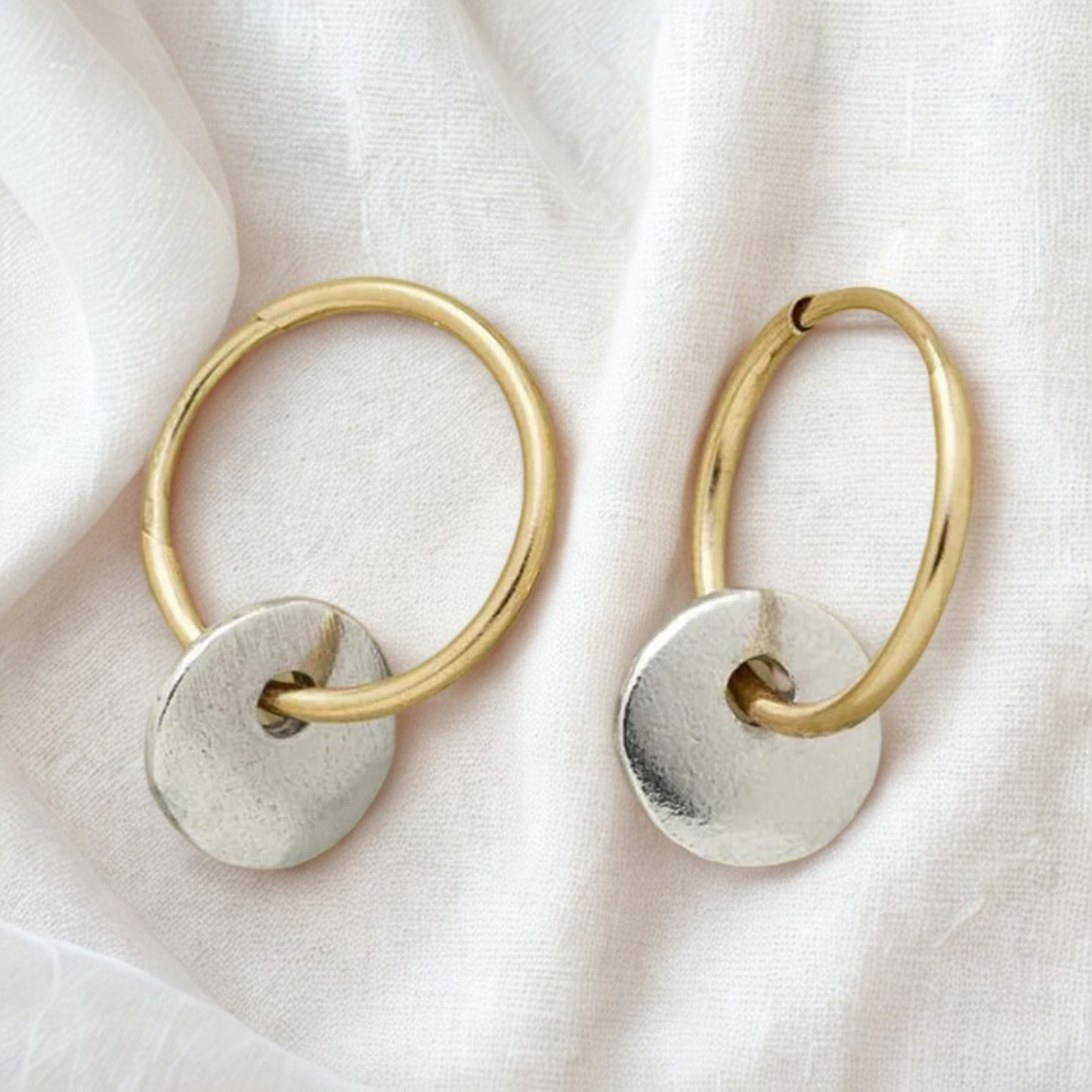 Gold-plated hoops and silver-plated earrings